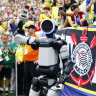 Hyundai robot Atlas brings the match ball out before the second half of the Brazil v Norway FIFA World Cup game, July 5, 2026.