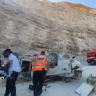 Fire and rescue forces work to assist the driver of a vehicle which fell off a cliff, July 7, 2026.
