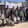  Employees of a water desalination plant speak to the press about the water crisis in the Gaza Strip. 