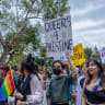 A WOMAN holds a placard reading ‘Queers 4 Palestine’ during the 2023 Taiwan Pride Parade. 