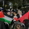 Palestinian Morocco fans gather for a public screening of the 2026 FIFA World Cup match between Morocco and Canada in Hebron, the occupied West Bank, on July 4, 2026. 