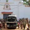 Prisoners board a bus to be transferred to another prison following clashes between two groups of inmates at Negombo Prison in the coastal town of Negombo, Sri Lanka, July 6, 2026.