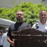 Government Media Office Director Ismail Thawabteh (R) and Hamas spokesperson Hazem Qassem (L) speak at a press conference regarding the resignation of the head of the Government Emergency Committee and the acting head of Government Follow-up.