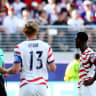 Folarin Balogun of the US is shown a red card by referee Raphael Claus on July 1, 2026.