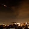 Rocket trails are seen in the sky amid a fresh barrage of Iranian missile attacks above the Israeli coastal city of Netanya on March 23, 2026.