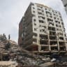 Rescuers work at the site of a collapsed building in the aftermath of the June 24 earthquakes, in La Guaira, Venezuela, July 5, 2026.