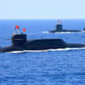 A nuclear-powered Type 094A Jin-class ballistic missile submarine of the Chinese People's Liberation Army (PLA) Navy in waters during a military display in the South China Sea April 12, 2018. 
