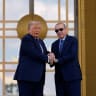 U.S. President Donald Trump shakes hands with Turkish President Recep Tayyip Erdogan as he arrives at the Bestepe Presidential Compound during a formal welcome for the NATO summit in Ankara, Turkey, Tuesday, July 7, 2026. 
