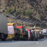  AFGHANISTAN-PAKISTAN-UNREST Goods carrier trucks stalled near the closed Torkham border crossing between Afghanistan and Pakistan in Nangarhar province on October 21, 2025.
