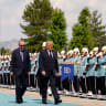 US President Donald Trump walks with Turkish President Recep Tayyip Erdogan during a formal arrival at the Bestepe Presidential Compound at the NATO summit in Ankara, Turkey, Tuesday, July 7, 2026. 