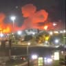 Smoke and flames rise after an explosion in Bandar Abbas, Hormozgan Province, Iran, in this screengrab obtained from a social media video released on July 8, 2026. 