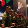 Security personnel stand guard on the day of a funeral procession for Iran's late Supreme Leader Ayatollah Ali Khamenei, who was killed on February 28 in Israeli and US airstrikes, in Najaf, Iraq, July 8, 2026.  