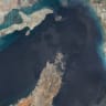 Maps4media-processed Sentinel-2 satellite imagery shows a broad overview of the Strait of Hormuz, including the Musandam Peninsula, nearby islands, coastal shallows, and the narrow maritime corridor linking the Persian Gulf with the Gulf of Oman.