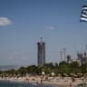 People visit a beach of the southern Athenian suburb of Glyfada on June 26, 2026; illustrative.
