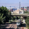 An intercity train moves along tracks in southern Tehran on June 20, 2026. 