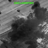 Smoke rises from explosions at an unknown location, following what US Central Command (CENTCOM) said were strikes on Iranian military targets, in this screen grab from a video released on July 8, 2026.