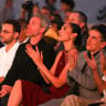 Israeli "Wonder Woman" star Gal Gadot (3rd-R) and Jerusalem film festival director Roni Mahadav-Levin (2nd-R) attend the opening ceremony of the event in Jerusalem on June 17, 2025. 