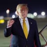 US President Donald Trump gestures as he steps off Air Force One to board the new Qatari-gifted Boeing plane, enroute to the United States following his participation in the NATO Summit at Royal Air Force Mildenhall on July 08, 2026 in Mildenhall, England.