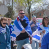 Milwaukee Jews march in the community's annual Walk for Israel, part of the federation's celebrations for Israel's independence day. 
