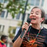 Ana Maria Archila speaks as Thousands welcome back Congress by marching for Citizenship, Care, And Climate Justice on September 21, 2021 in Washington, DC. 