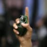 Illustrative: Hand grenade -  A member of the Popular Resistance Committee holds up a grenade during a rally in Gaza City, 27 April 2006.