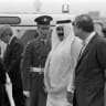 FILE PHOTO: Qatar's heir apparent Sheikh Hamad bin Khalifa Al Thani (L) is greeted by Lord Hesketh, representing Queen Elizabeth II, on his arrival for an official visit at Heathrow Airport in London, Britain, March 20, 1988.
