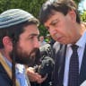 MK Zvi Sukkot visiting the city of Rahat as residents protest his visit, July 12, 2026.