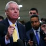 US Sen. Lindsey Graham (R-SC) speaks to members of the media as the Trump Cabinet briefs members of Congress on Iran at the US Capitol on March 3, 2026 