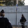 French police officers stand guard in front of the Synagogue of Sarcelles, Paris's suburb, on October 11, 2023, after recent Hamas attacks in Israel.