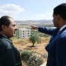 US Representative Ro Khanna (D-CA) speaks with a Palestinian resident of Turmus Ayya, near Ramallah, during a visit in the West Bank, July 9, 2026.