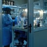 Employees work during a visit by South African President Cyril Ramaphosa and Democratic Republic of the Congo President Felix Tshisekedi at the National Institute of Biomedical Research in Kinshasa, Democratic Republic of the Congo, July 2, 2026. 