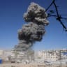 Smoke rises following an Israeli strike on a metal foundry in Gaza City, July 12, 2026.