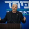 Head of opposition and head of the Yesh Atid party MK Yair Lapid leads a faction meeting at the Knesset, the Israeli parliament in Jerusalem, on July 13, 2026.