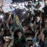 Houthi supporters hold up weapons as they demonstrate against airstrikes on Sanaa International Airport, in Sanaa, Yemen July 13, 2026.
