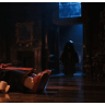 A still from an Iranian propaganda channel "Explosive Media" creates Lego AI propaganda video showing a shadowy figure causing senator Lindsey Graham's fatal heart attack, July 12, 2026.