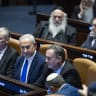 Prime Minister Benjamin Netanyahu attends a Knesset vote on a bill to freeze arrests of haredi draft evaders, in Jerusalem, July 14, 2026