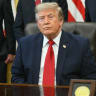 US President Donald Trump looks on after signing an executive order to drastically shrink two national monuments in Utah, paving the way for fossil fuel extraction and mining, at the Oval Office of the White House in Washington, DC, on July 13, 2026.