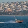 A US Coast Guard boat searches for two missing individuals after a pontoon boat capsized on July 14, 2026 in San Francisco, California. 