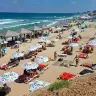 Here is not Europe: Our beachgoers can still open umbrellas. Hatzuk Beach, this month.
