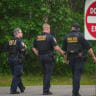 Department of Homeland Security (DHS) officers are seen outside of a federal immigration office after a man was fatally shot by U.S. Immigration and Customs Enforcement (ICE) agents, on July 14, 2026 in Scarborough, Maine.