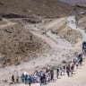 Israeli left-wing activists and Palestinians demonstrate against violence by extremist Israeli settlers in the West Bank, near the unrecognized Bedouin village of Khan al-Ahmar, east of Jerusalem, June 12, 2026.