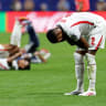 occer Football - FIFA World Cup 2026 - Semi Final - England v Argentina - Atlanta Stadium, Atlanta, Georgia, U.S. - July 15, 2026 England's Ezri Konsa looks dejected after the match as England are eliminated from the World Cup.