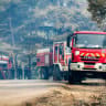 Illustrative: Firetrucks are pictured as firefighters attempt to extinguish a blaze at Chrea National Park, in the south of Algeria's Blida province, on August 27, 2025.