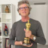 RICHARD TRANK with his Oscar, at home in Herzliya.