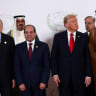 World leaders including U.S. President Donald Trump, Egypt's President Abdel Fattah al-Sisi, Turkish President Tayyip Erdogan and Qatar's Emir Sheikh Tamim bin Hamad Al Thani pose for a family photo, at a world leaders' summit on October 13, 2025 in Sharm El-Sheikh, Egypt. 