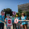 Activists protest against a bill promoting gender-segregated academic study tracks, introduced by MK Limor Son Har-Melech, outside the Knesset, the Israeli parliament in Jerusalem, July 6, 2026.