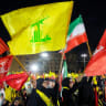 Shia movement Hezbollah attend a memorial ceremony mourning Iran's slain supreme leader Ali Khamenei in Beirut's southern suburbs on July 8, 2026.