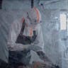 A doctor provides care to a patient with Ebola virus disease at the Rwampara Ebola Treatment Centre (ETC) in Bunia, Ituri, in the east of the Democratic Republic of Congo on July 13, 2026. 