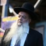 Rabbi Yigal Cohen light candles for the 45 victims who were killed in a stampede, at the scene of the fatal disaster, at Mt Meron, last week. May 06, 2021.