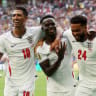 Bukayo Saka #7 of England celebrates scoring his team's fifth and hat trick goal with teammates Jude Bellingham #10 and Reece James #24 during the FIFA World Cup 2026 Bronze Final between France and England at Miami Stadium on July 18, 2026 in Miami Gardens, Florida. 